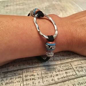 Antique silver tone faux suede bracelet